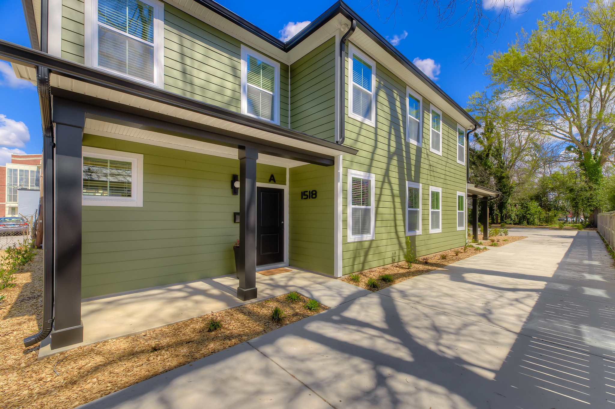 WilsonCo-built multi-family housing with green siding and modern design in Columbia South Carolina