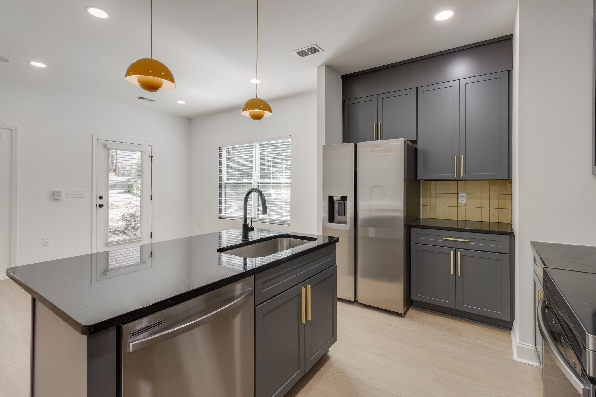 WilsonCo-built student housing kitchen with modern cabinetry and stainless steel appliances in Cayce South Carolina